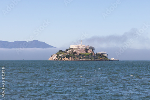 San Francisco, USA - March 2020 - View of Alcatraz Island in San Francisco, California, on a foggy day. Feredal prison. © Gabriel Ramos