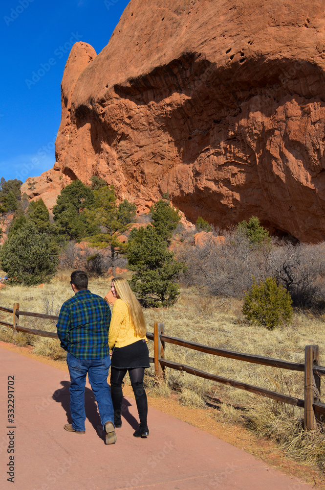Man and women hike in garden of the Gods