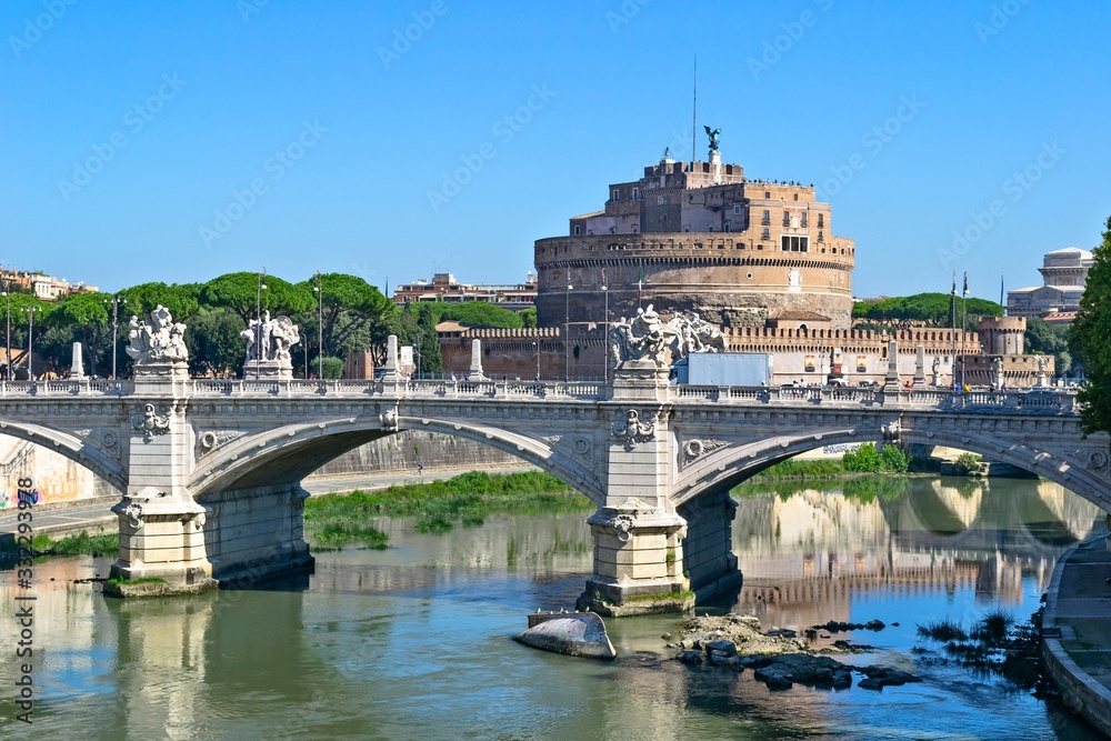 View on Saint Angel castle and bridge over the Tiber river in Rome, Italy.