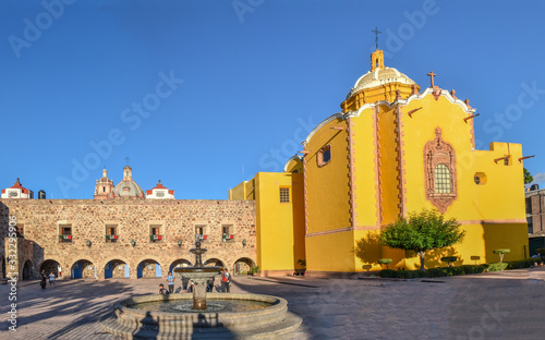 Aranzazu chapel with its bright yellow fachade photo