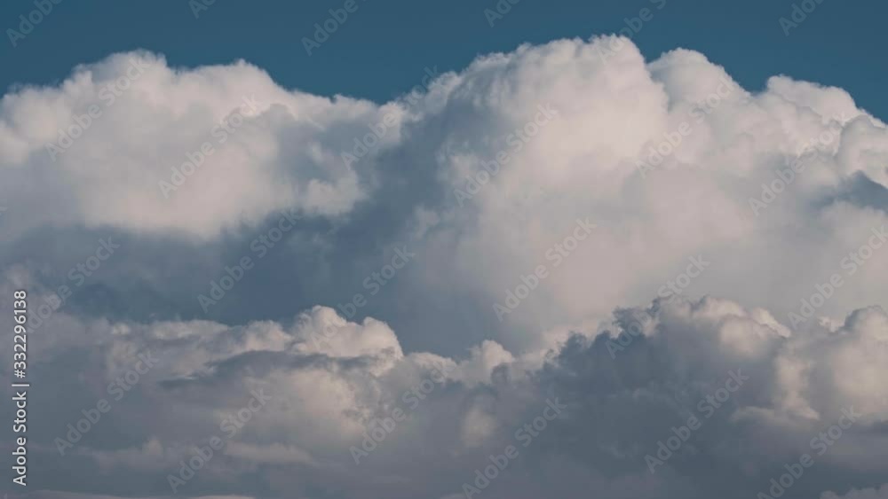 Amazing volumetric clouds in the blue sky Amazing volumetric clouds in the blue sky