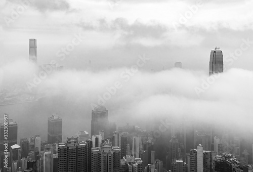 Photography Skyline of Victoria harbor of Hong Kong city in fog