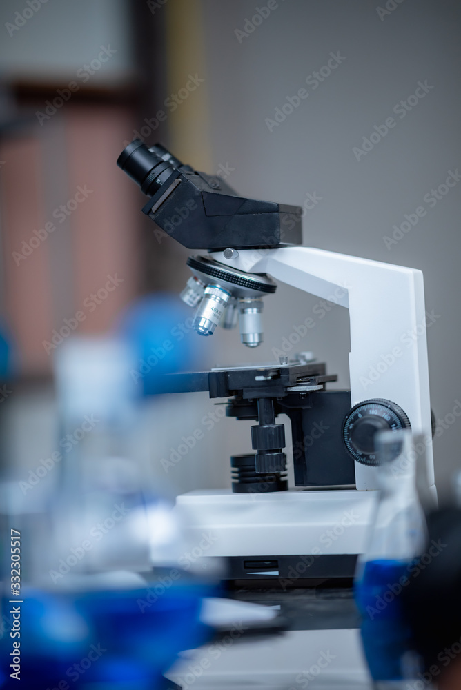 Closeup of Scientific microscope data analysis in the laboratory Closeup of Scientific microscope data analysis in the laboratory