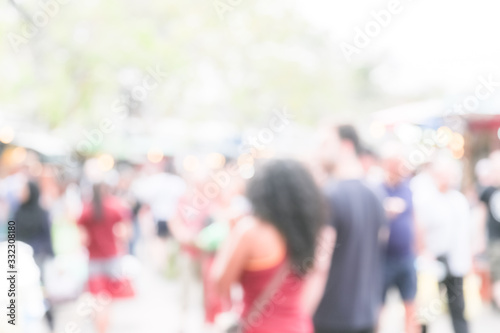 Blur of people and environment at weekend market
