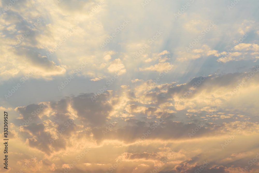 Beautiful vanilla sky with clouds and sunlight before sunset in the evening Beautiful vanilla sky with clouds and sunlight before sunset in the evening