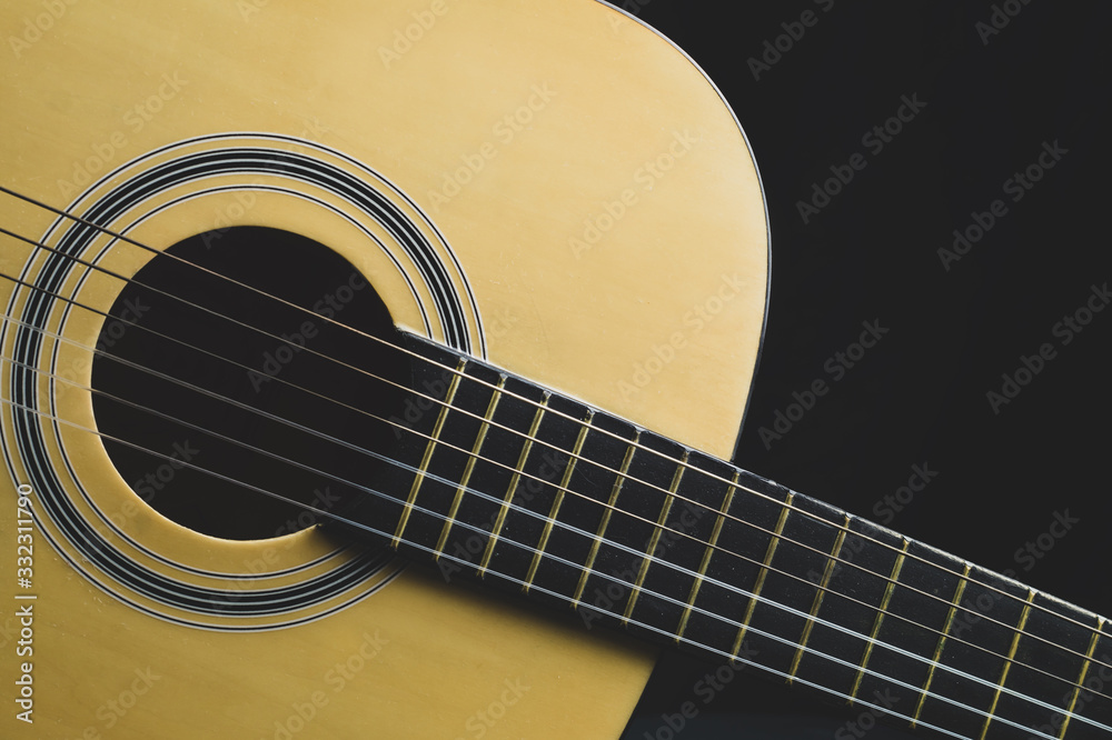 Acoustic guitar close up. musical instrument. strings on the guitar neck