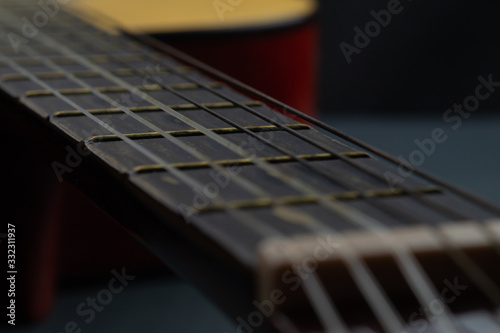 Acoustic guitar close up. musical instrument. strings on the guitar neck