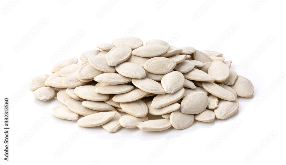 Pumpkin seeds on the white background Pumpkin seeds on the white background