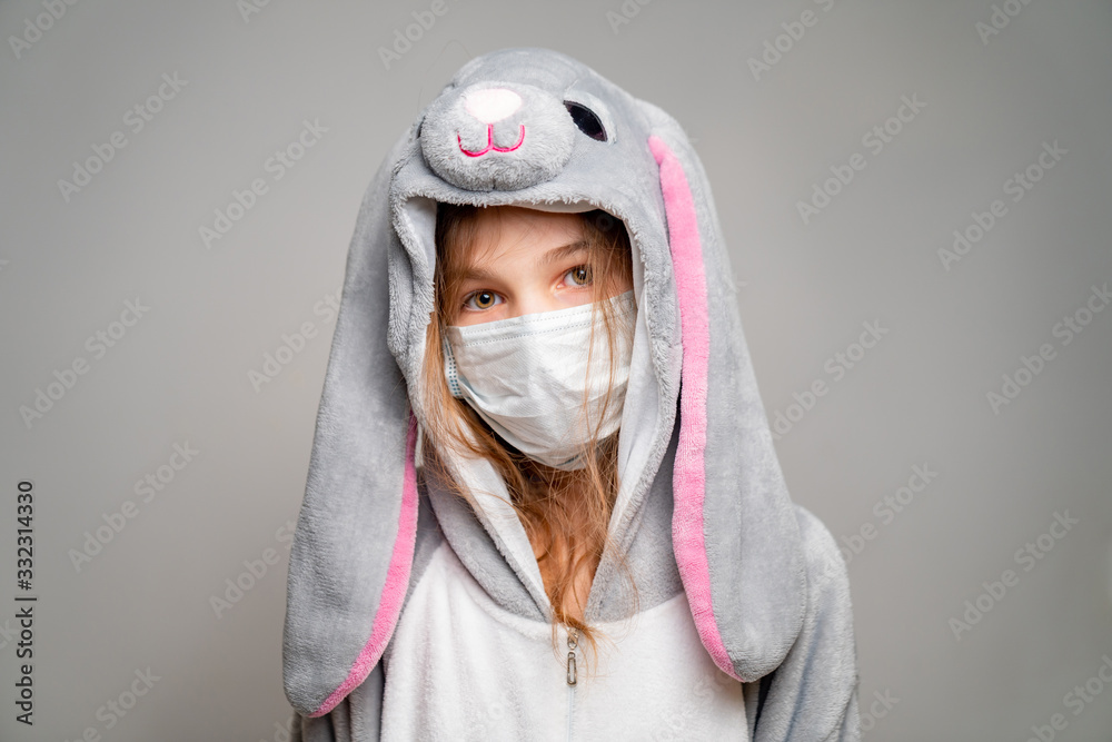 teen in kigurumi in medical mask. close up teen in kigurumi in medical mask. close up