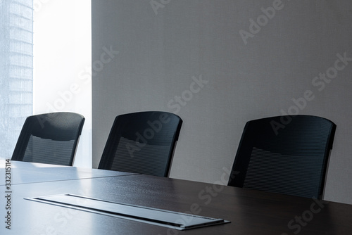 Modern office meeting room table and chairs