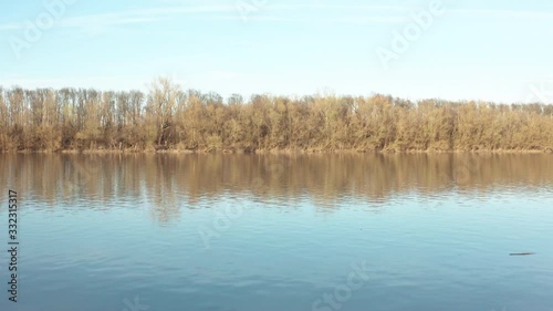 Wallpaper Mural Forwarding drone over river at Sunset in Spring season. Beautiful sunset with colorful nature blue water and yellow forest. Torontodigital.ca