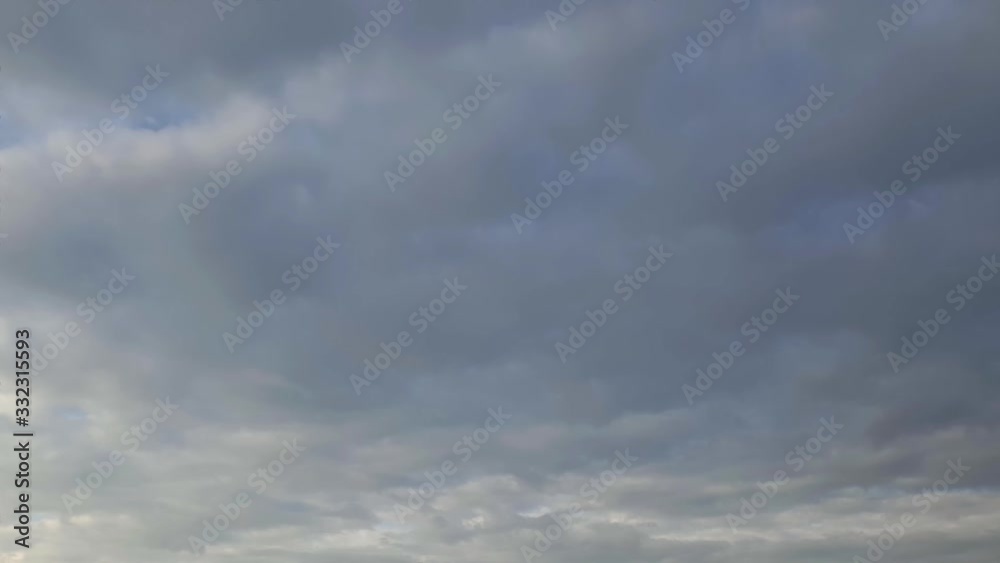 Summer sky rain cloud time lapse in the mid afternoon. fast moving cloud formations. dense thick clouds. Summer sky rain cloud time lapse in the mid afternoon. fast moving cloud formations. dense thick clouds.