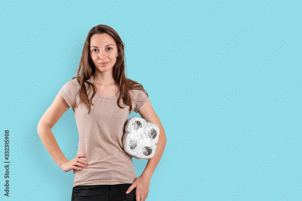 Young woman with toilet paper rolls on white background. Covid-19 panic shopping Young woman with toilet paper rolls on white background. Covid-19 panic shopping