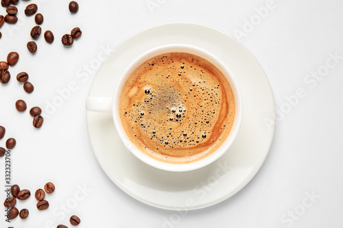 Cup of hot coffee on white background, top view © Pixel-Shot