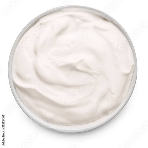 Bowl with tasty sour cream on white background