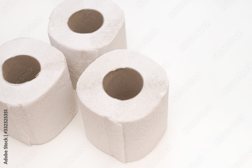 Rolls of toilet paper arranged on white background Rolls of toilet paper arranged on white background
