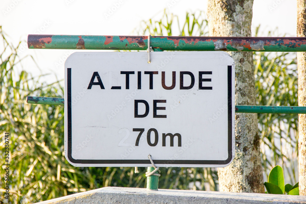 Fototapeta premium brazilian information boards with the words: altitude of 70 meters