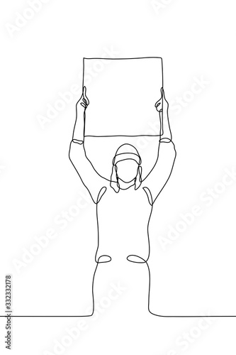 One continuous line art of a young woman in a hat standing with a blank poster raised above her head. Black vector outline of a protesting woman attracting attention isolated on a white background.