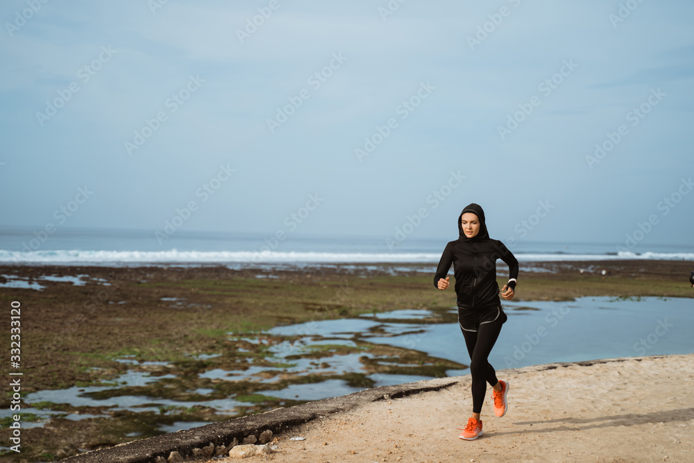 portrait of muslim sport runner woman outdoor