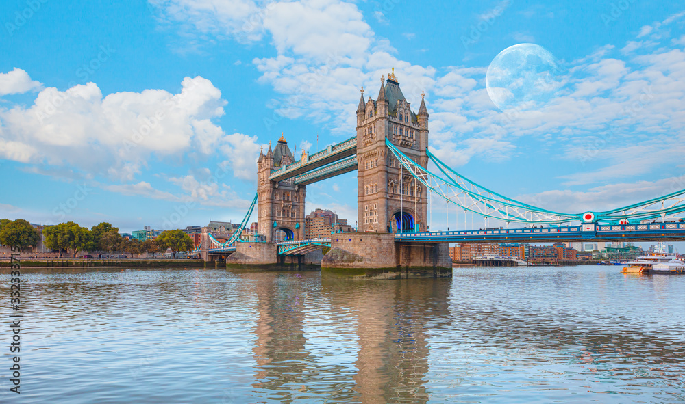 Panorama of the Tower Bridge, Tower of London on Thames river with full moon  - London, United Kingdom