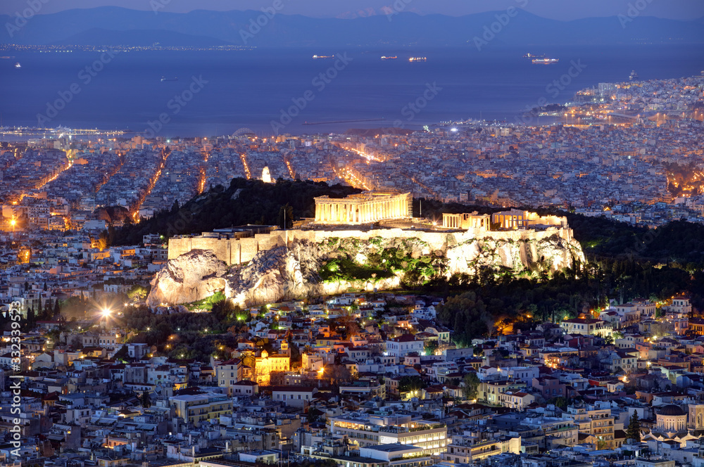 Athens skyline panorama with Acropolis in Greece from peak Lycabettus at night