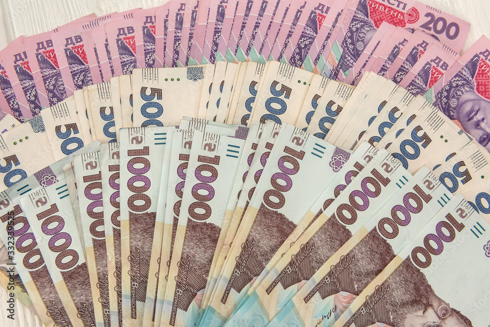 new ukrainian money. 200 500 and 1000 banknote as background. uah. new ukrainian money. 200 500 and 1000 banknote as background. uah.
