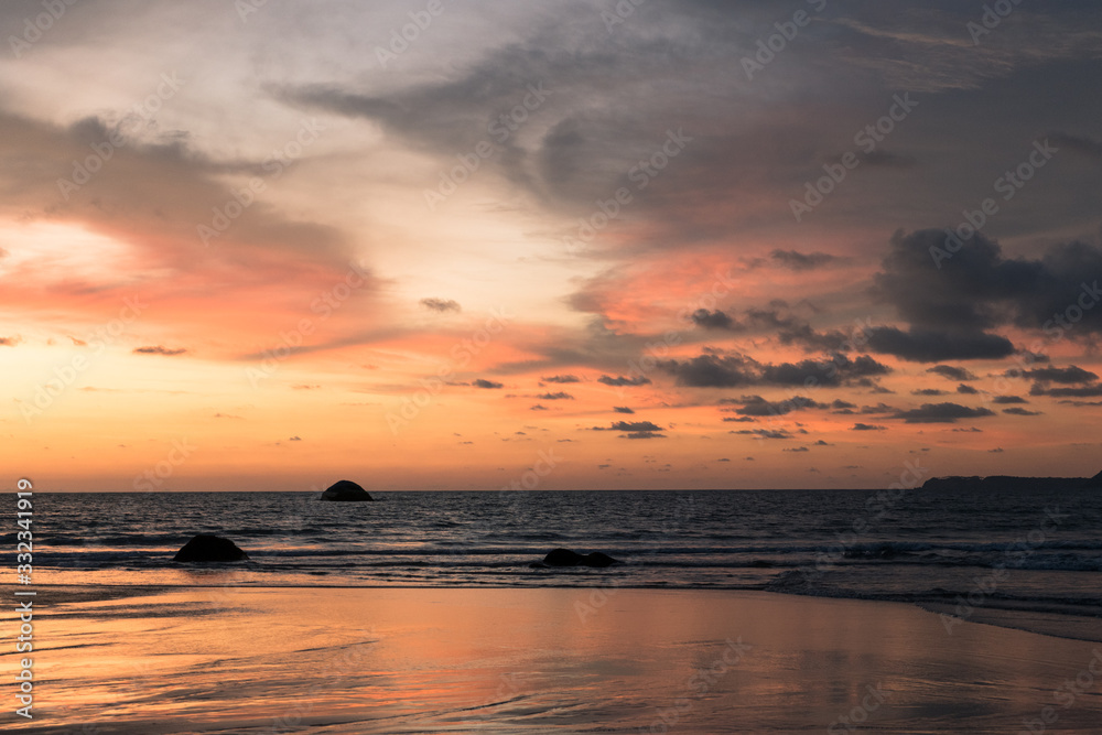 beautiful colorful sunset on agonda beach in goa, india