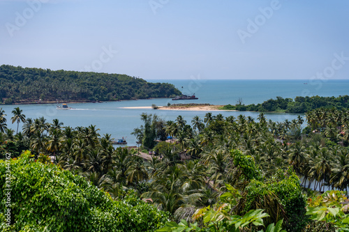 aerial panoramic view over the lush rich farm lands and backwaters of goa, india