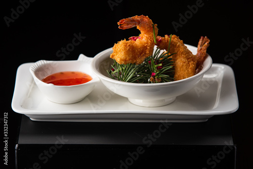 king prawns in batter with sauce photo