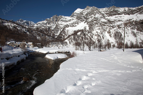 Devero Park ( Verbano-Cusio-Ossola ), Italy - January 15, 2017: A river in Alpe Devero Park, Ossola Valley, VCO, Piedmont, Italy