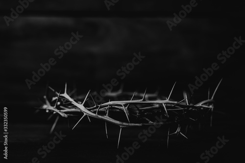 Valokuvatapetti Black and white  of  the crown of thorns of Jesus on  wooden background with cop