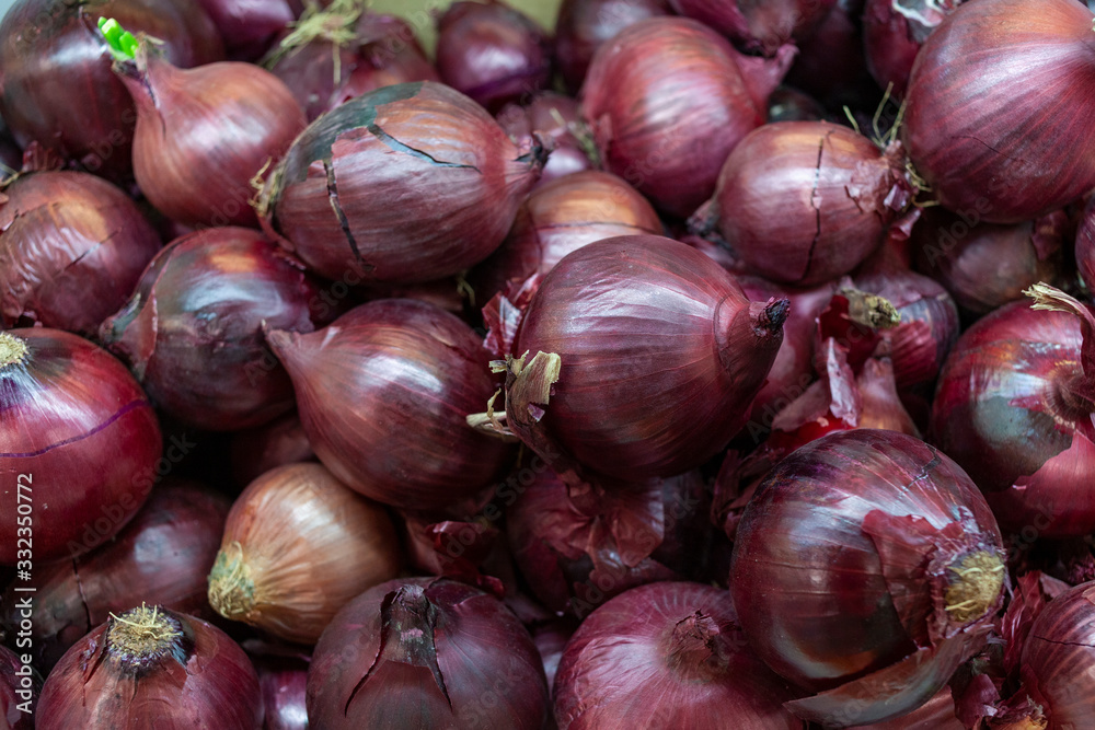 Purple Onions at the counter of a supermarket. Purple Onions at the counter of a supermarket.