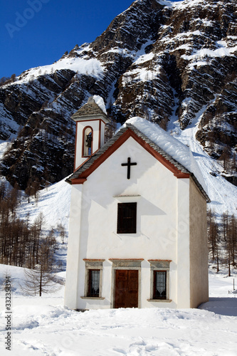 Devero Park   Verbano-Cusio-Ossola    Italy - January 15  2017  The church in Crampiolo village at Alpe Devero Park  Ossola Valley  VCO  Piedmont  Italy