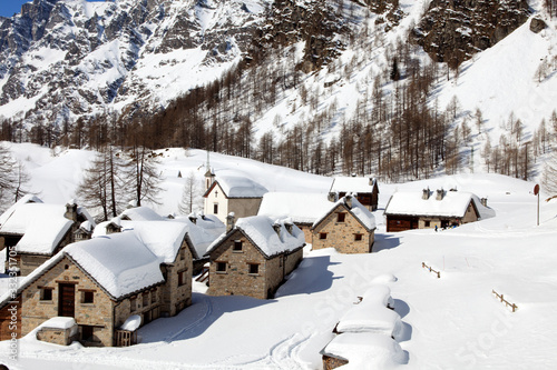 Devero Park ( Verbano-Cusio-Ossola ), Italy - January 15, 2017: Crampiolo village and houses in Alpe Devero Park, Ossola Valley, VCO, Piedmont, Italy © PaoloGiovanni