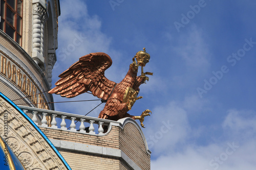 Detail of orthodox Church of the Holy Trinity at the Borisovo Ponds (Orekhovo-Borisovo), Moscow city, Russia. Two-headed eagle. Religious architecture. Moscow landmark. Coat of arms of Russian empire photo