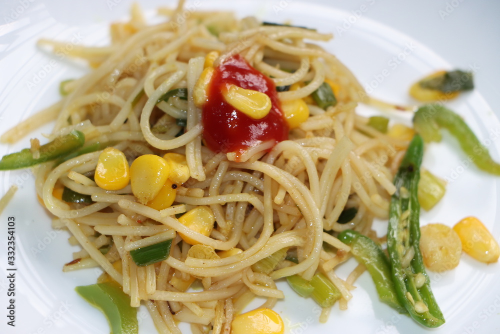 Vegetable Hakka noodles with sweet corn, capsicum, spring onions Vegetable Hakka noodles with sweet corn, capsicum, spring onions