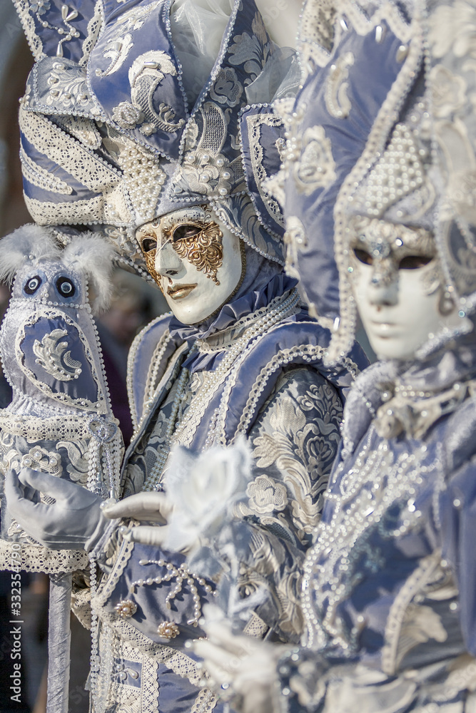 Blue masks at the Venice carnival