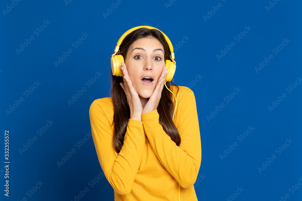 Brunette girl wearing a yellow T-shirt Brunette girl wearing a yellow T-shirt