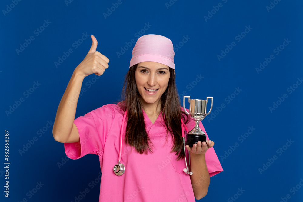 Young doctor with a pink uniform Young doctor with a pink uniform