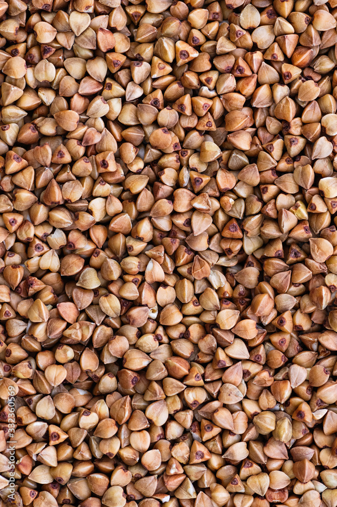 Buckwheat groats closeup. Diet concept. Abstract background. Buckwheat groats closeup. Diet concept. Abstract background.