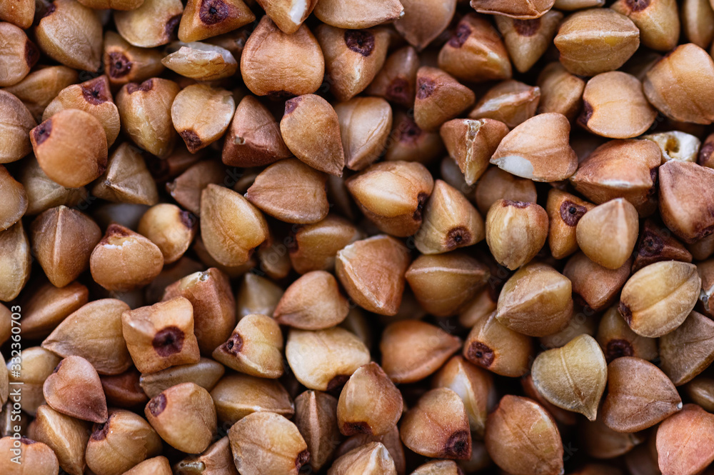 Buckwheat groats macro. Healthy nutrition, diet. Abstract background. Buckwheat groats macro. Healthy nutrition, diet. Abstract background.