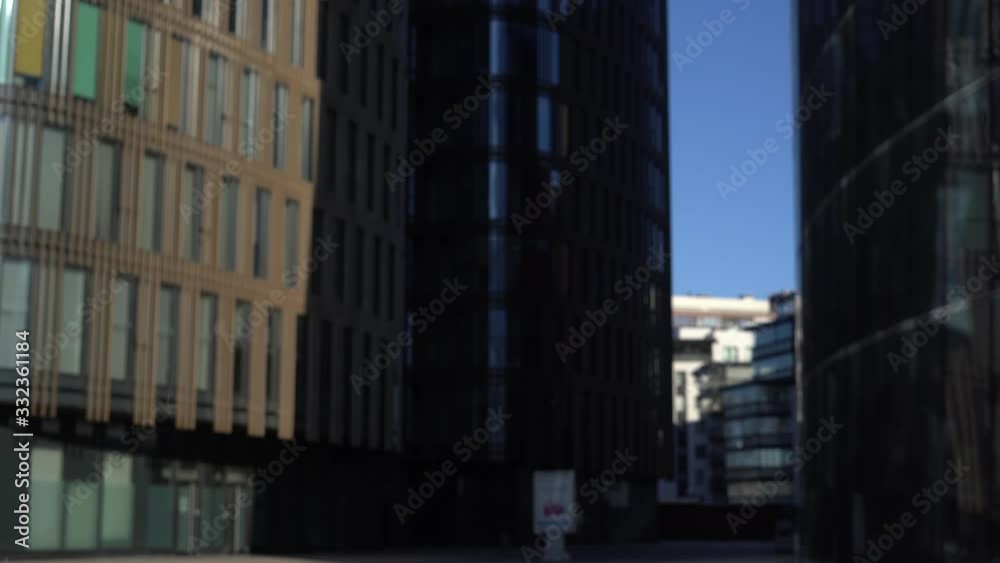 Young Business Woman Goes out An Office Building Young Business Woman Goes out An Office Building