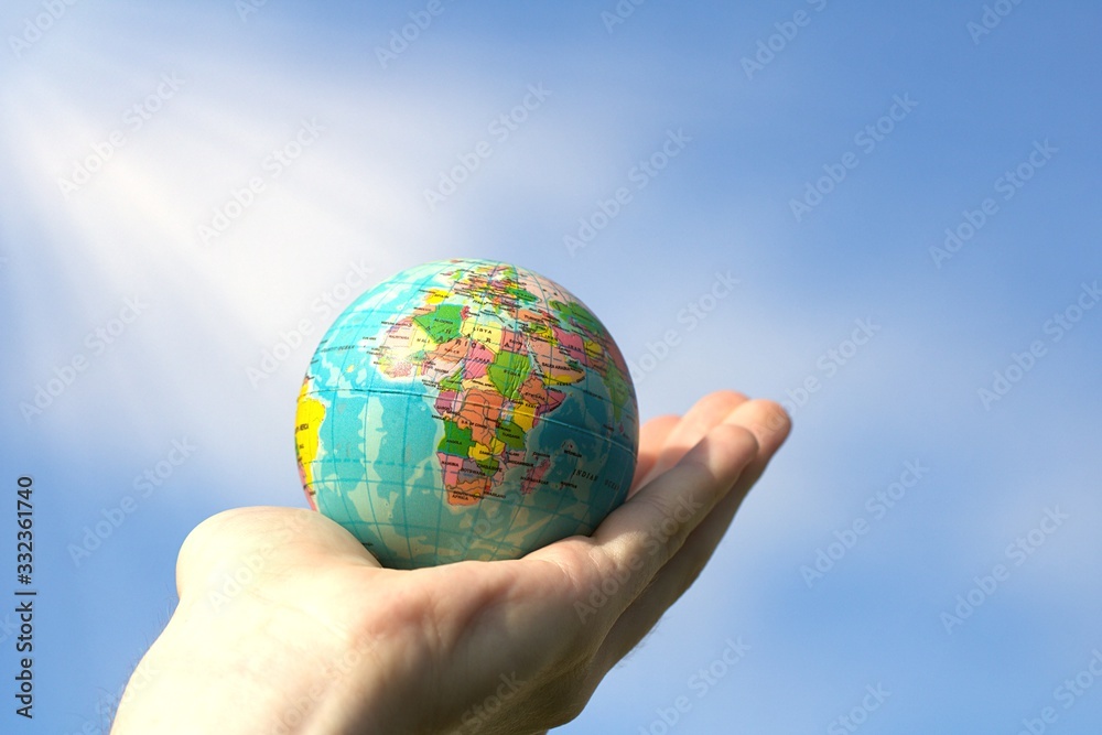 Earth globe in Hands Earth globe in Hands