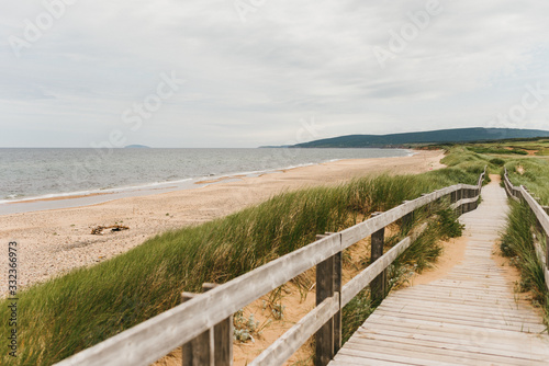 Fényképezés Wood boardwalk at Inverness Beach on the west coast of Cape Breton Island, Nova