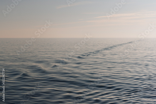 Calm ocean water surface background © Sandra