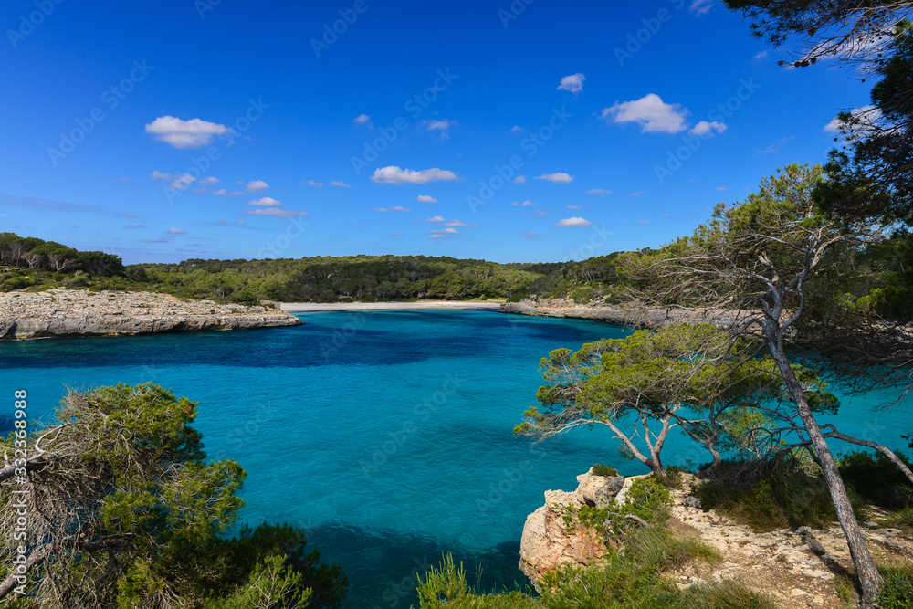 Turquoise waters of a bay in the Mondrago Natural Park, Mallorca, Spain