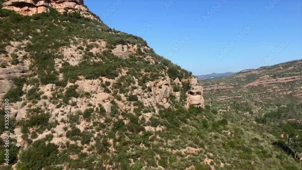 Slow motion shot of side of mountain, Montserrat, Spain, pov cable car Slow motion shot of side of mountain, Montserrat, Spain, pov cable car