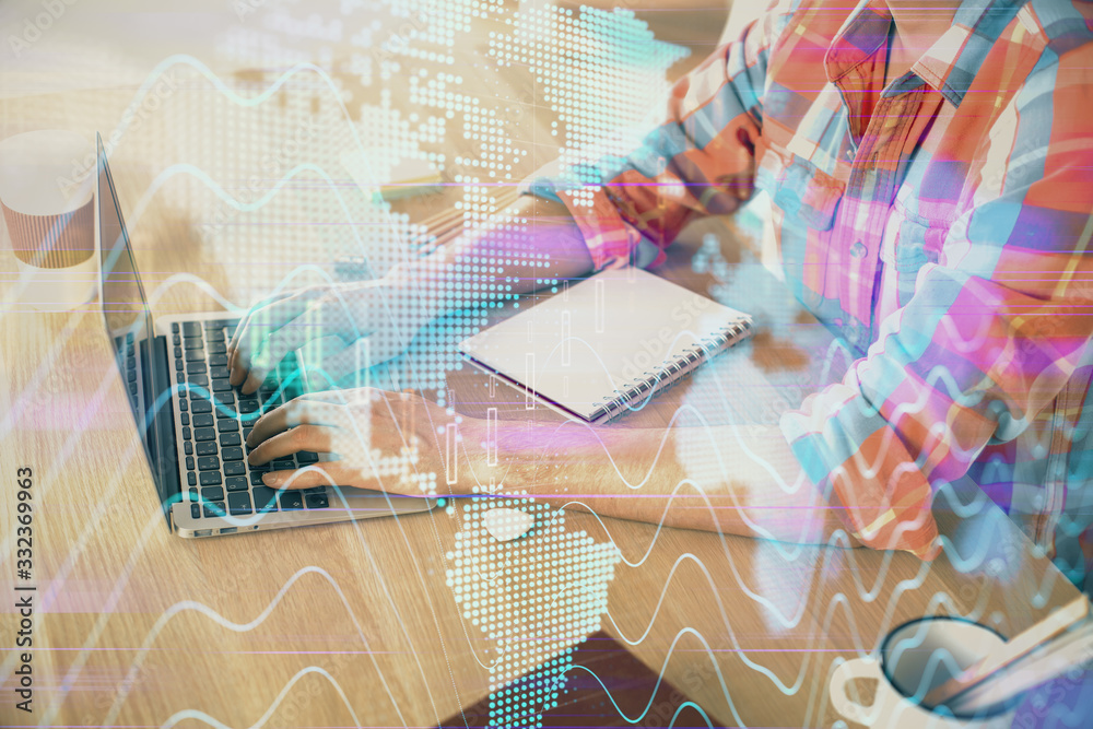 Multi exposure of forex graph with man working on computer on background. Concept of market analysis.