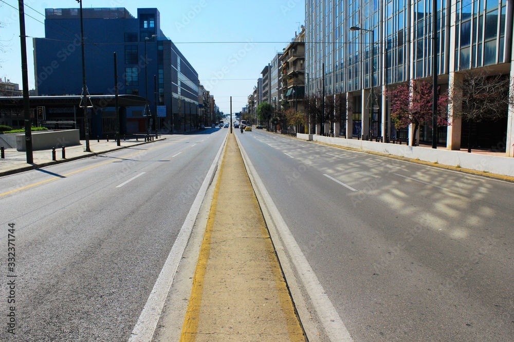 Athens, Greece, March 21 2020 - Empty Suggrou Avenue, one of the most crowded streets of Athens due to Coronavirus outbreak. Athens, Greece, March 21 2020 - Empty Suggrou Avenue, one of the most crowded streets of Athens due to Coronavirus outbreak.