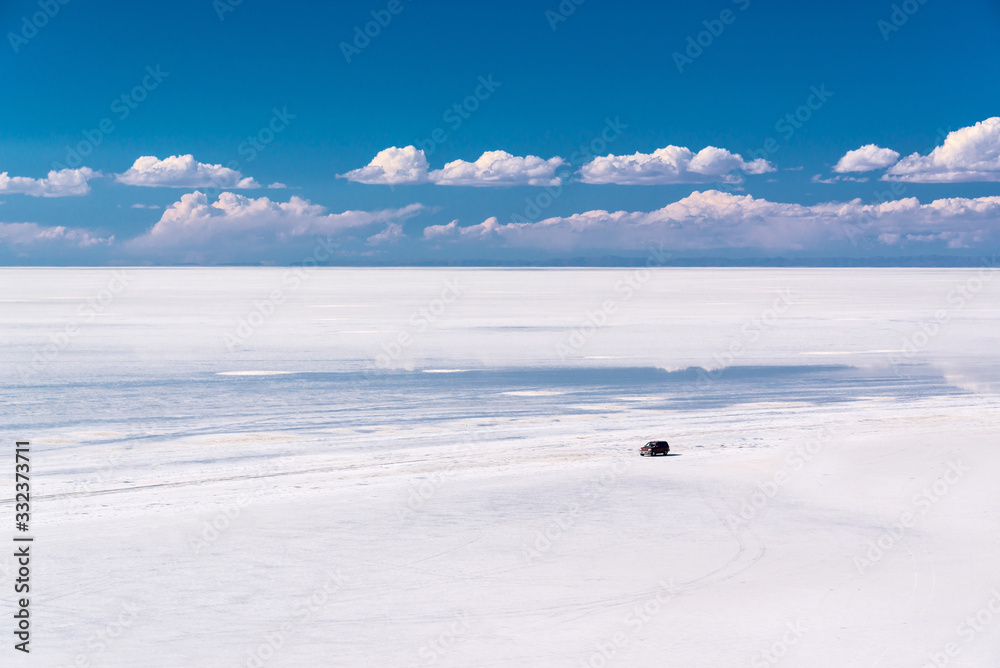 SUV car in Salar de Uyuni (Uyuni salt flats), Potosi, Bolivia